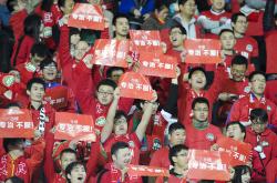 米兰体育-中国足球在国际舞台上展现实力，取得胜利